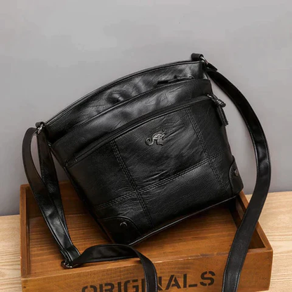 Flevos - veganläder crossbodyväska
