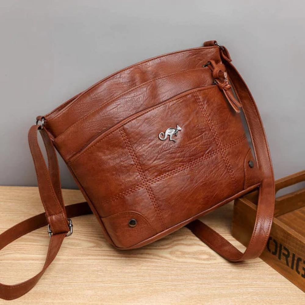 Flevos - veganläder crossbodyväska